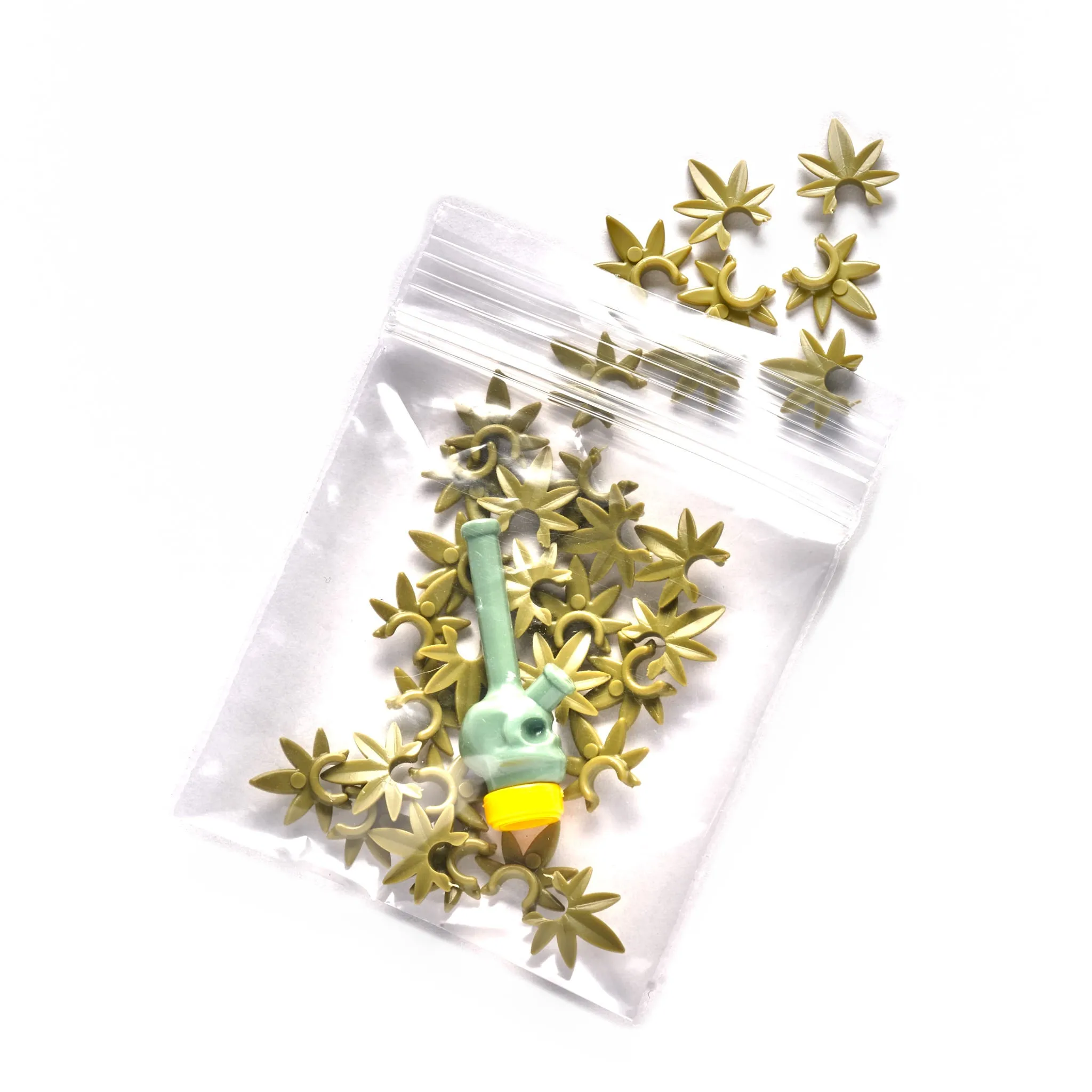 Small Bag of Fake Marijuana and Toy Bong