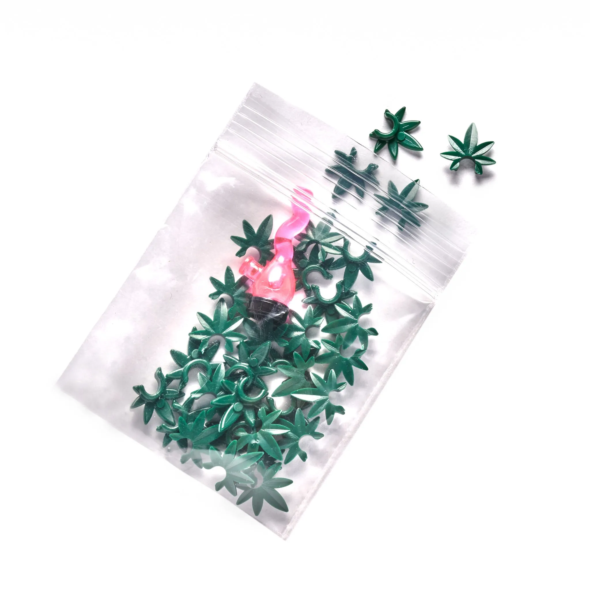 Small Bag of Fake Marijuana and Toy Bong